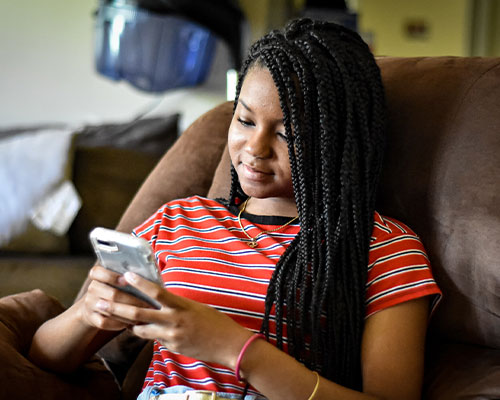 High school girl on cell phone